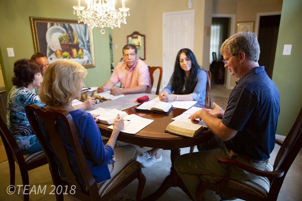 Missionaries Keith and Dawn meet with members of their church to study the Bible.