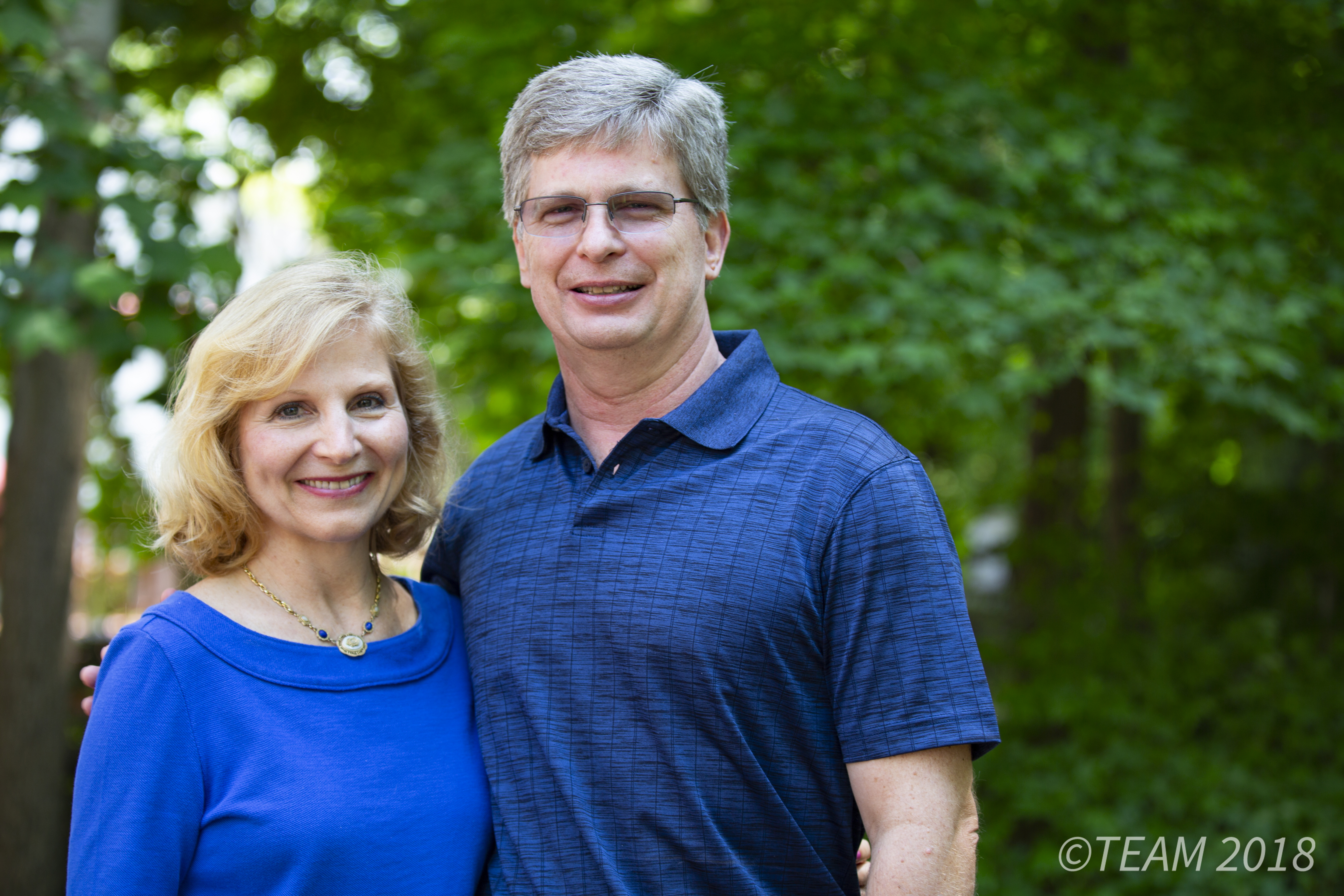 Missionaries Keith and Dawn Moore pose outside of their home in Charlotte, NC.