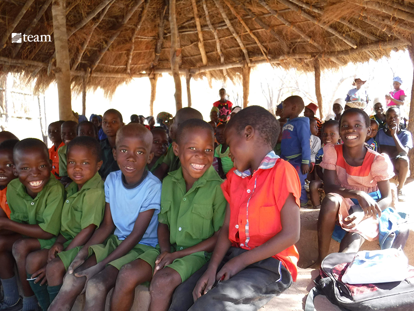 Children attending school under the temporary shelter