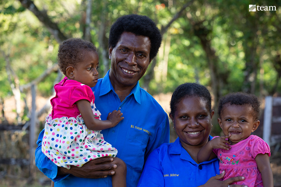 Papuan family with two children.