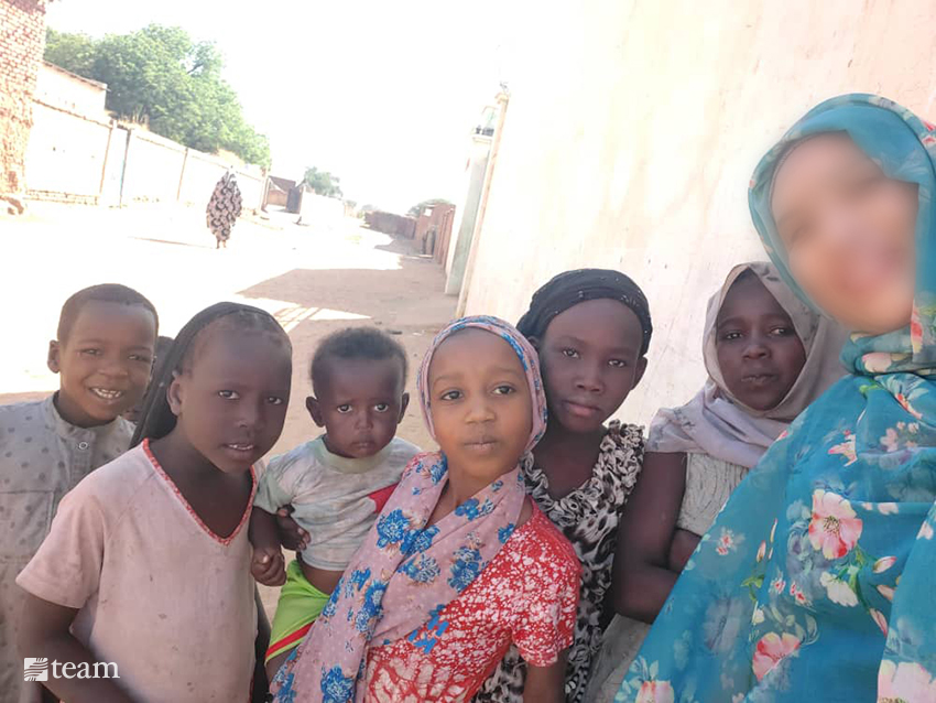 Lady with several children.