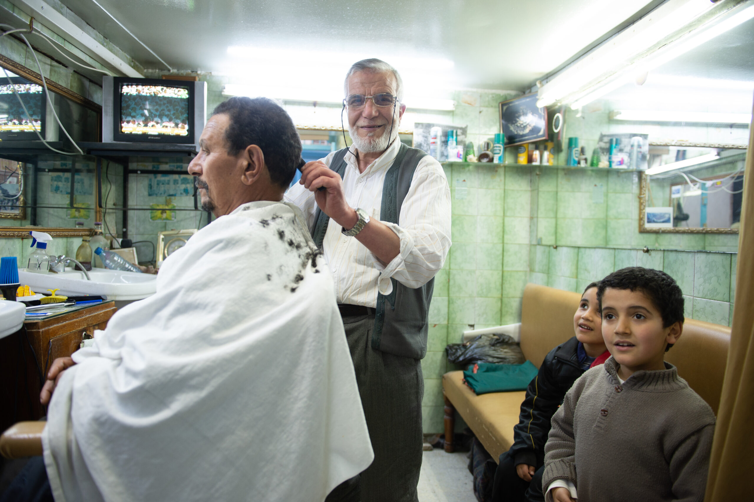 Man getting a haircut.