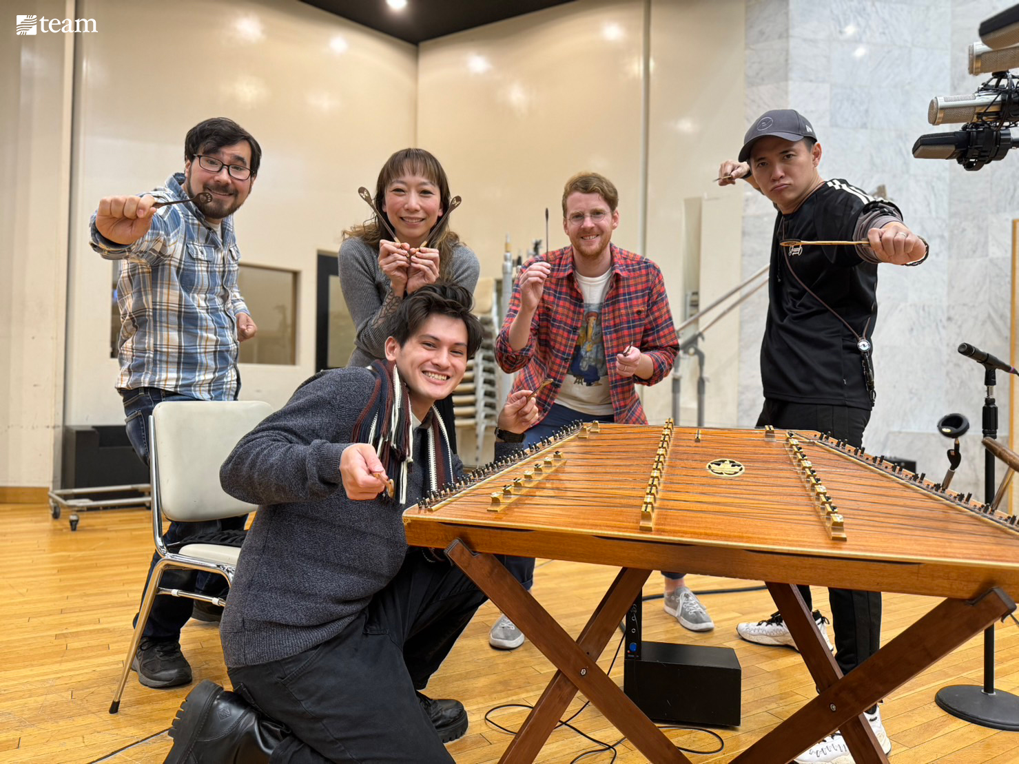 Group composing music in a studio.